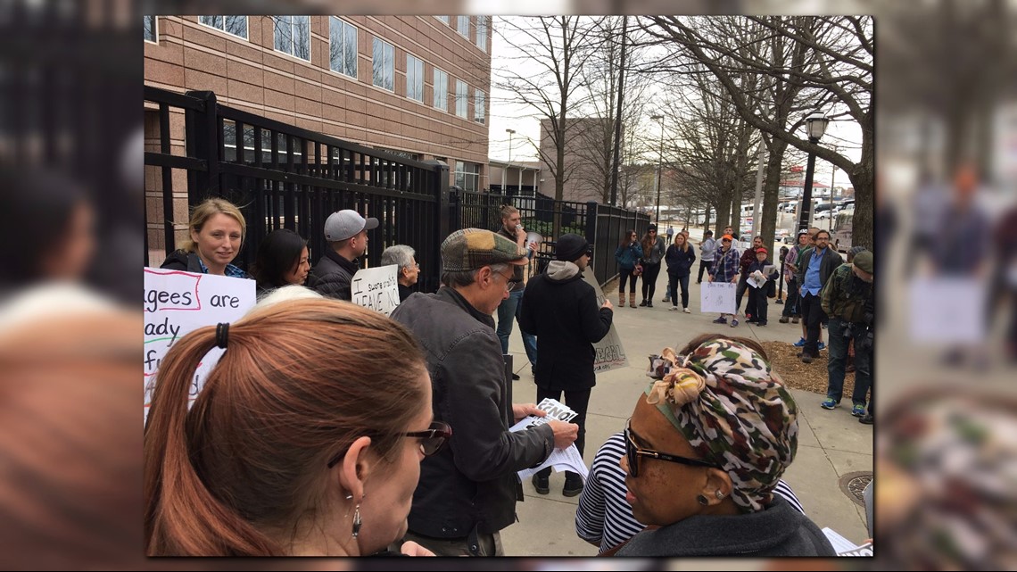 Demonstrators outside Atlanta immigration court protest Trump policies ...