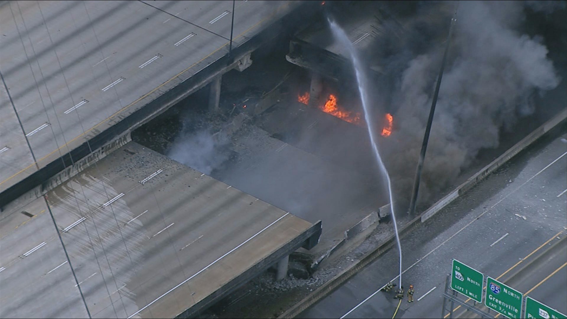PHOTOS Fire burning under Atlanta Interstate