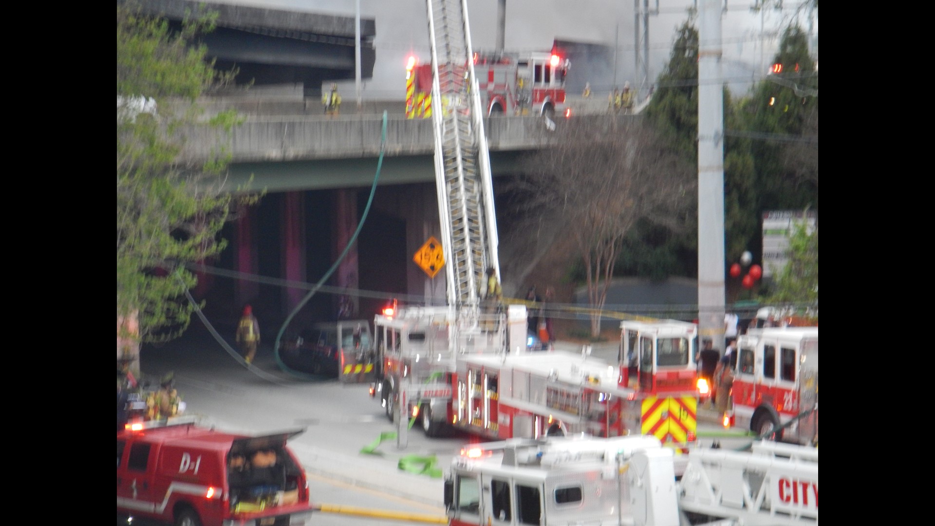 PHOTOS Fire burning under Atlanta Interstate