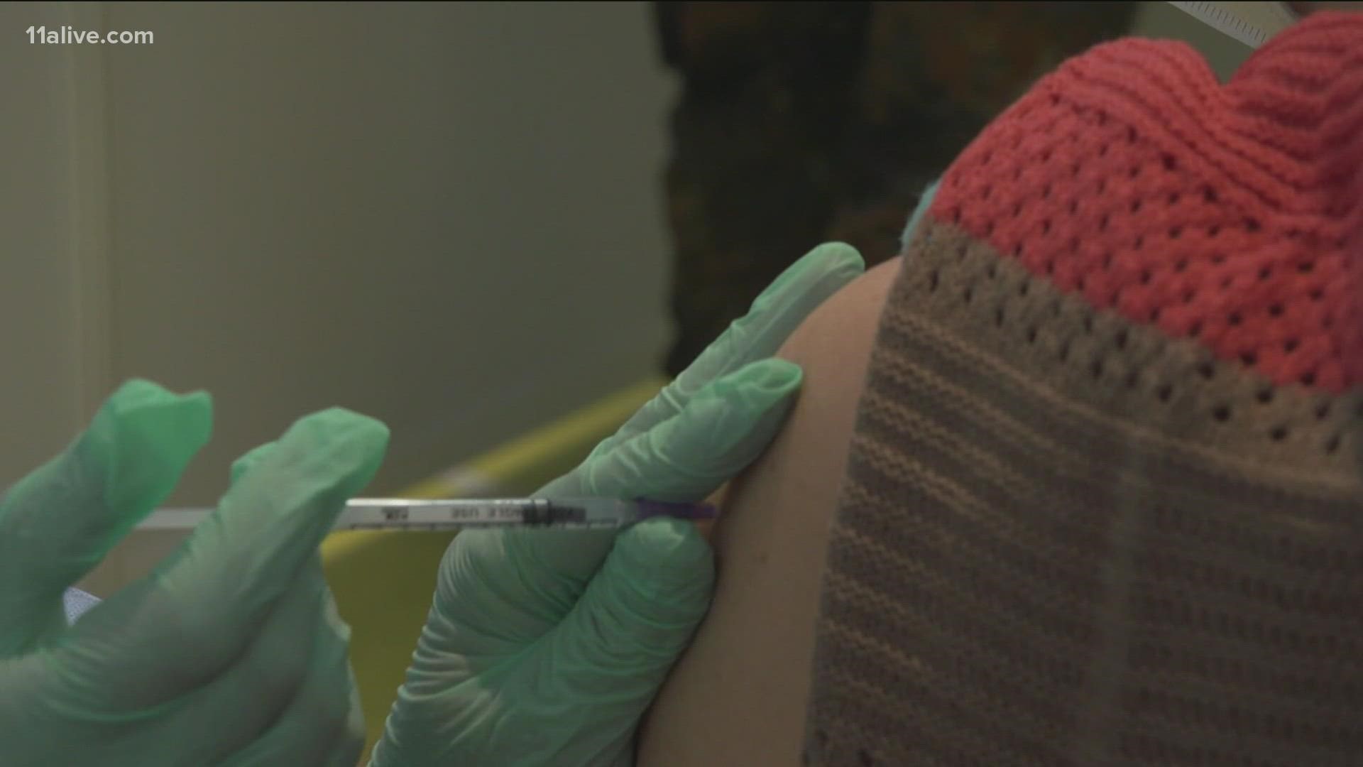 A growing number of vaccinated Georgians who have not gotten their booster shot are getting COVID.