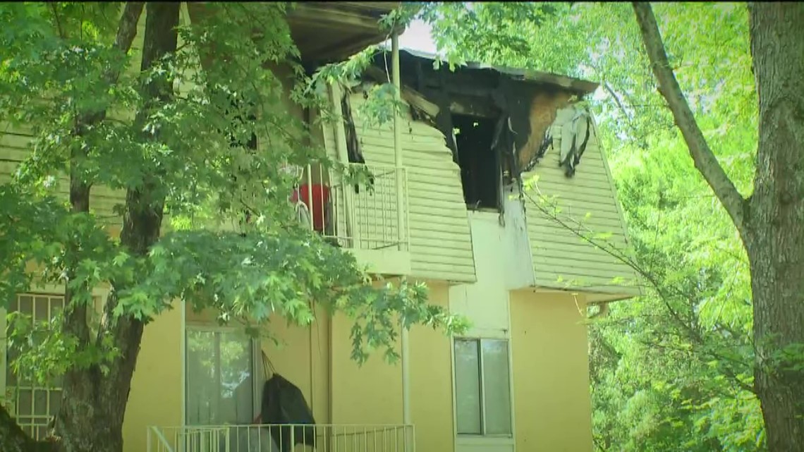 Firefighter catches baby dropped from second floor during fire ...