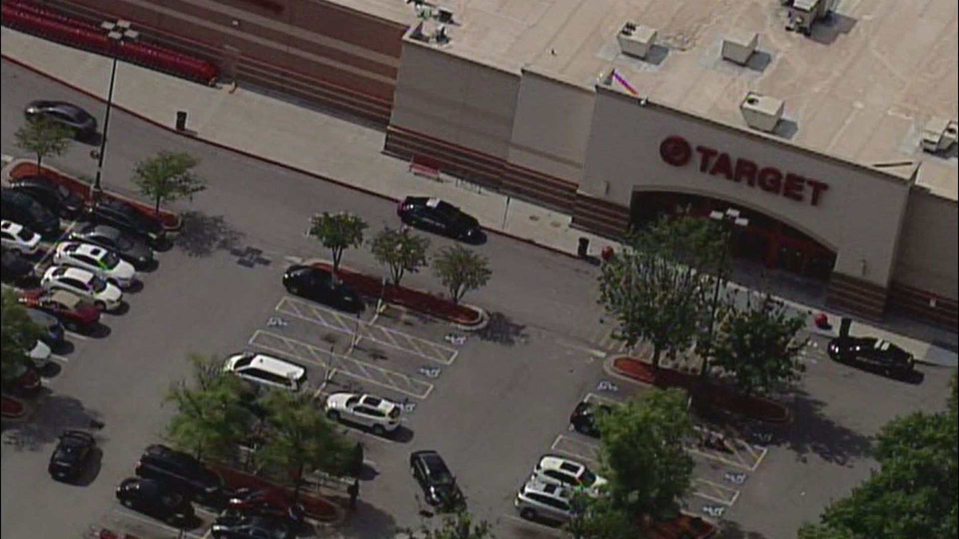Police: Woman shot man after he poured liquid on her in Target parking ...