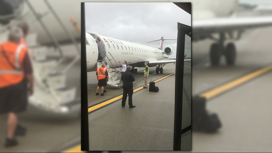 PHOTOS Delta flight blows tire at HartsfieldJackson airport; aborts