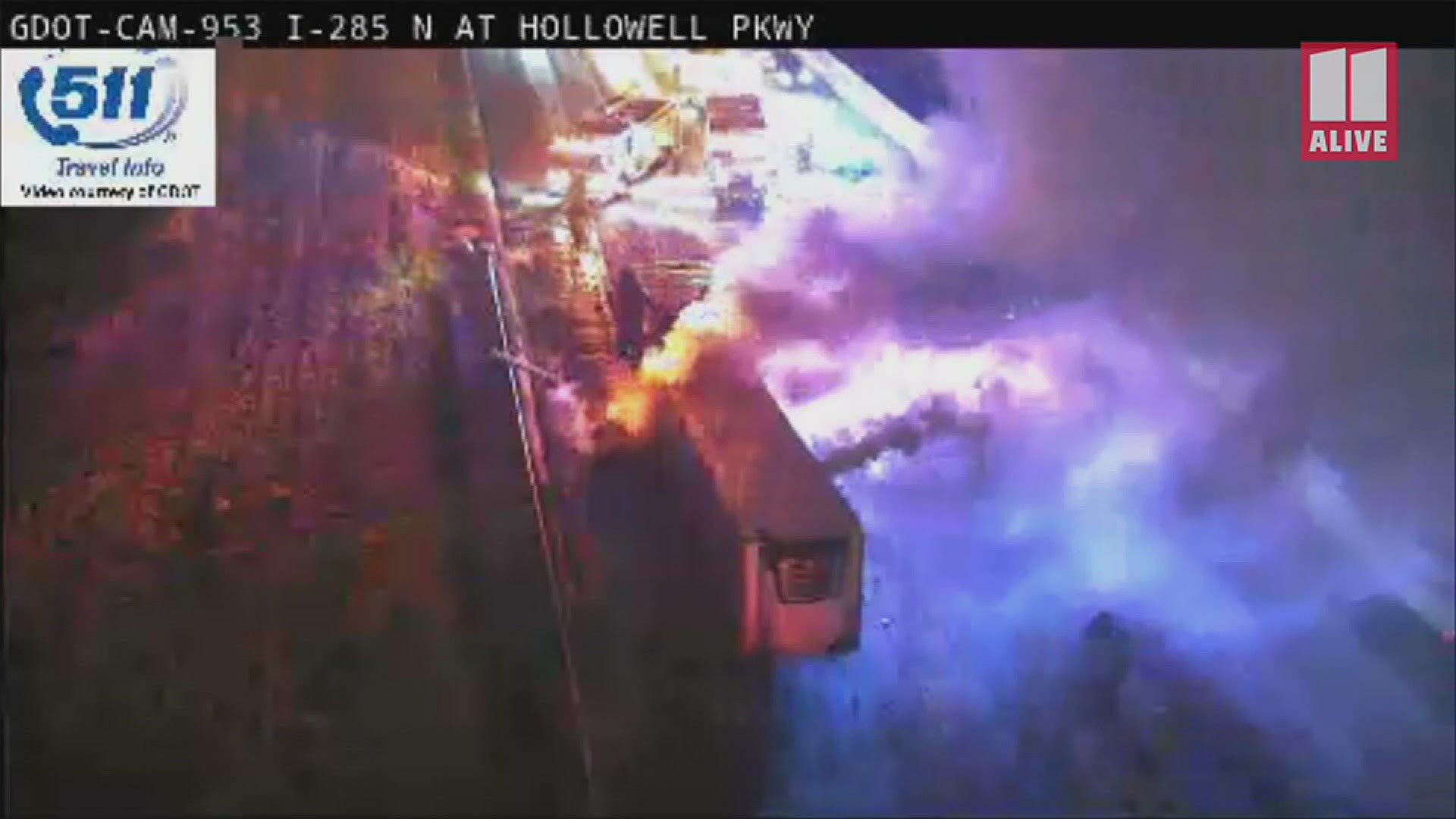 Fire crews are working to put out a large fire from the back of a tractor-trailer on I-285 near Donald Lee Hollowell Parkway.
