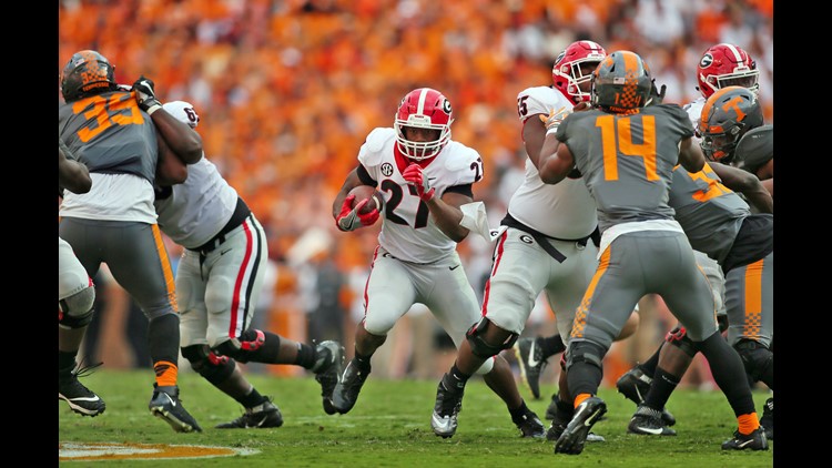 Georgia fans with a tribute to Nick Chubb 