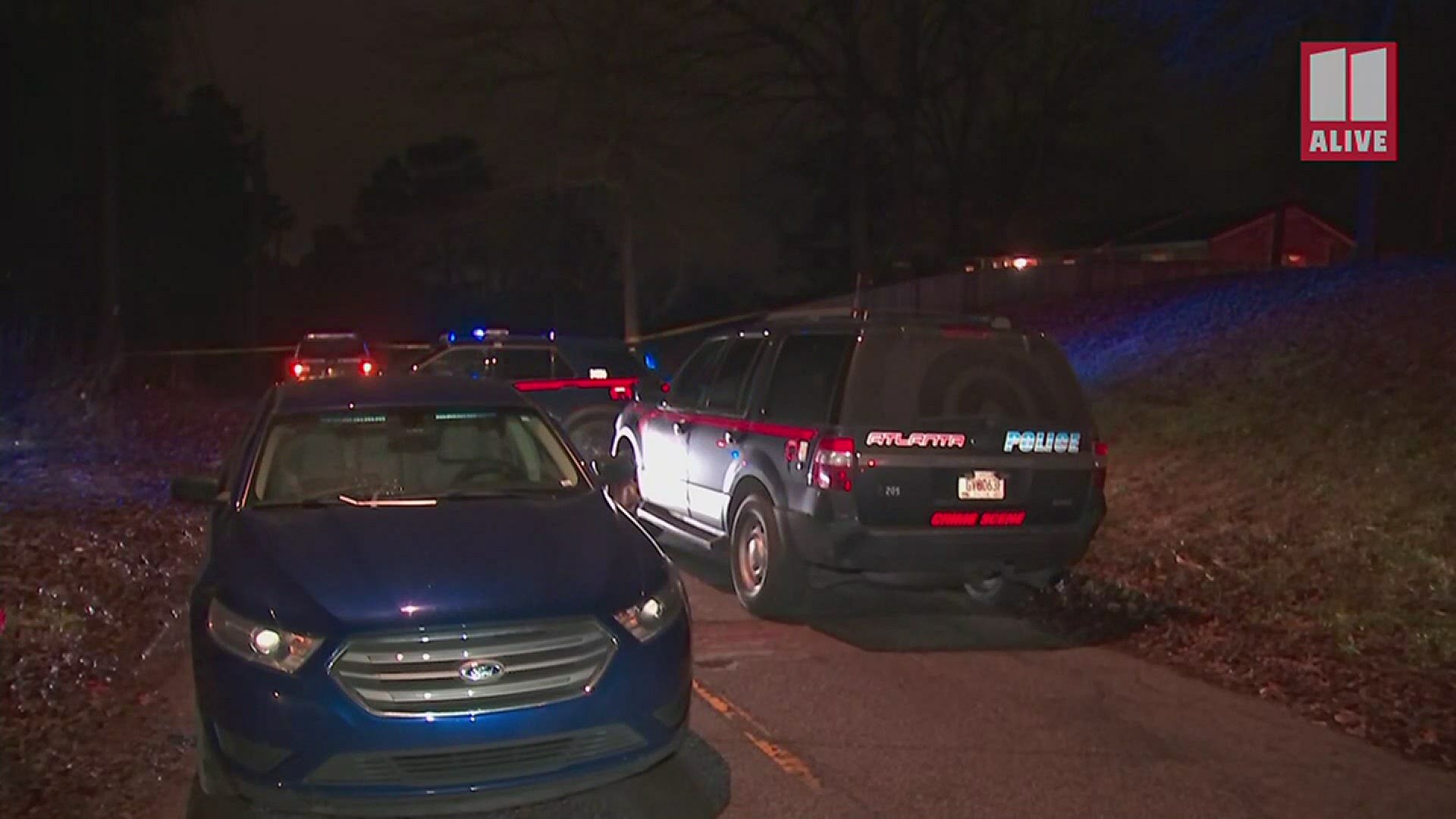 Atlanta Police are investigating a shooting into a crowded home Thursday night that left a woman critically injured.
