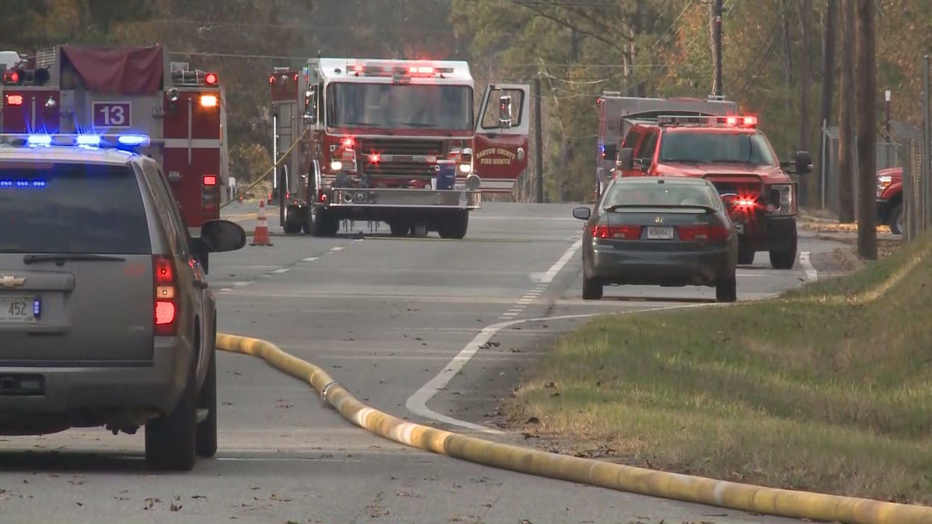 Tractortrailer driver dies after crash causes house fire in
