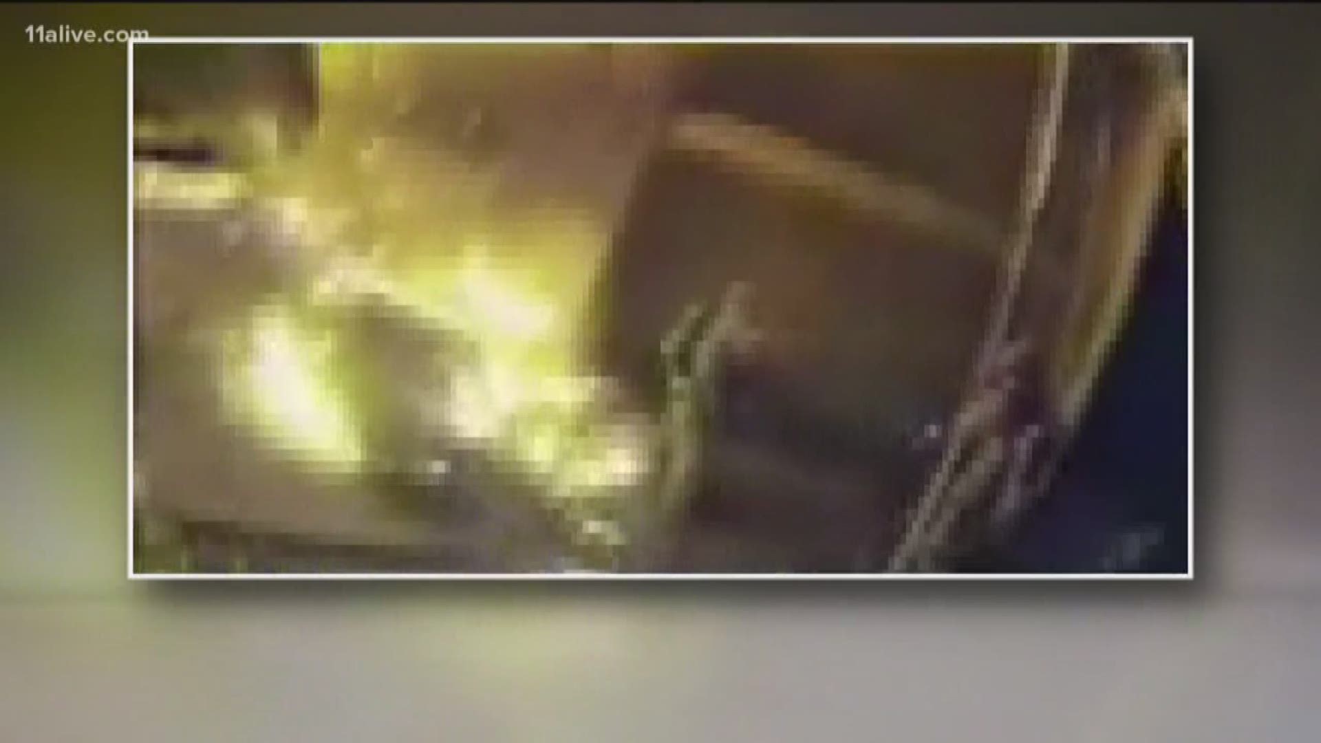 DeKalb Fire Department released video showing a firefighter catching a child being thrown from a window during an apartment fire on January 3.