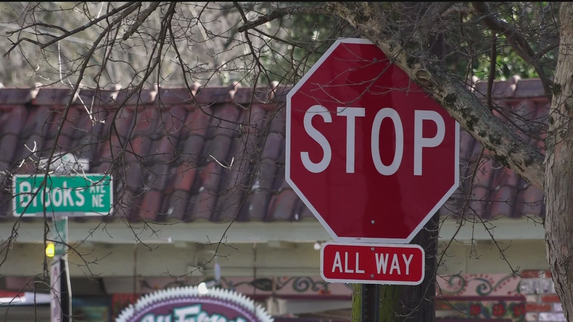 A neighborhood organization spent a year and a half advocating for extra stop signs along McLendon Avenue. They want to know who took them down.