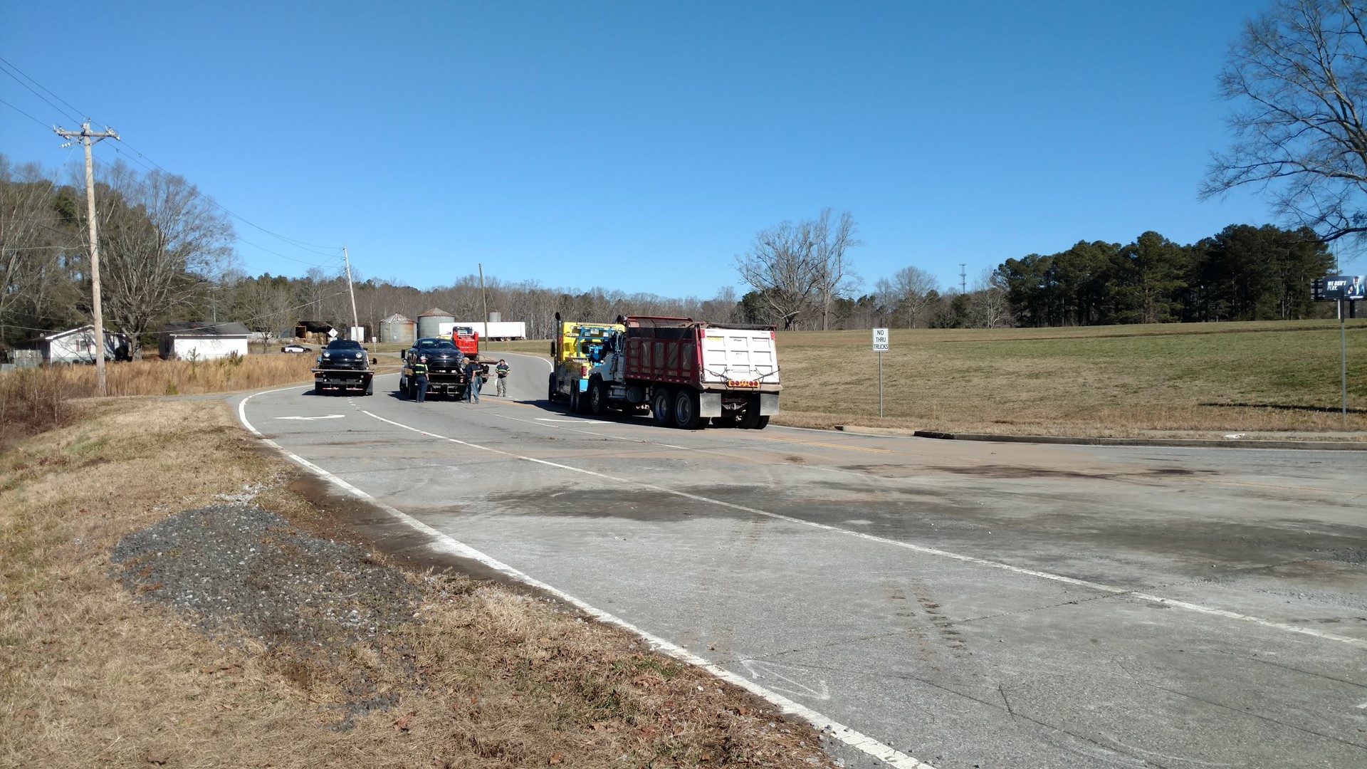 Overturned dump truck sends two people to the hospital | 11alive.com