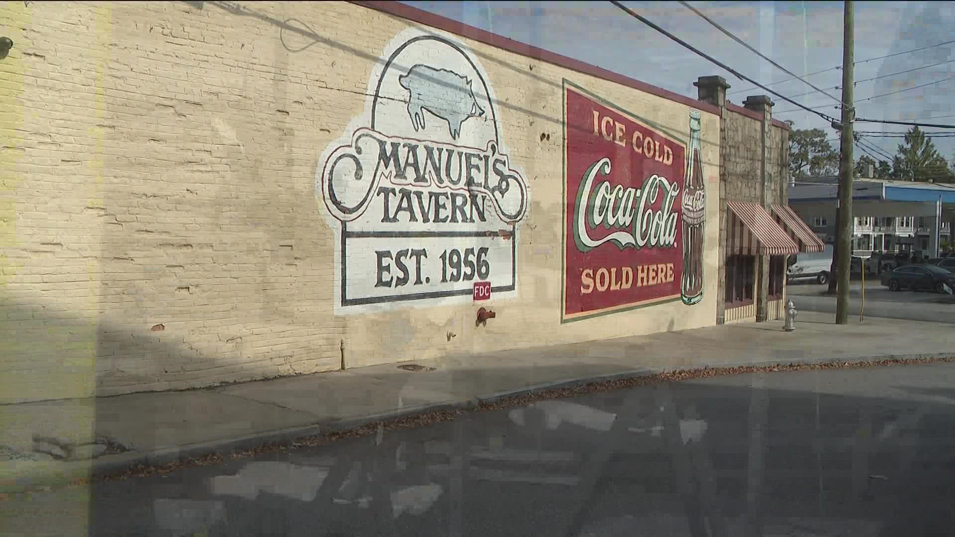 Police and the tavern's owner said the man was trying to stop someone from breaking into vehicles.