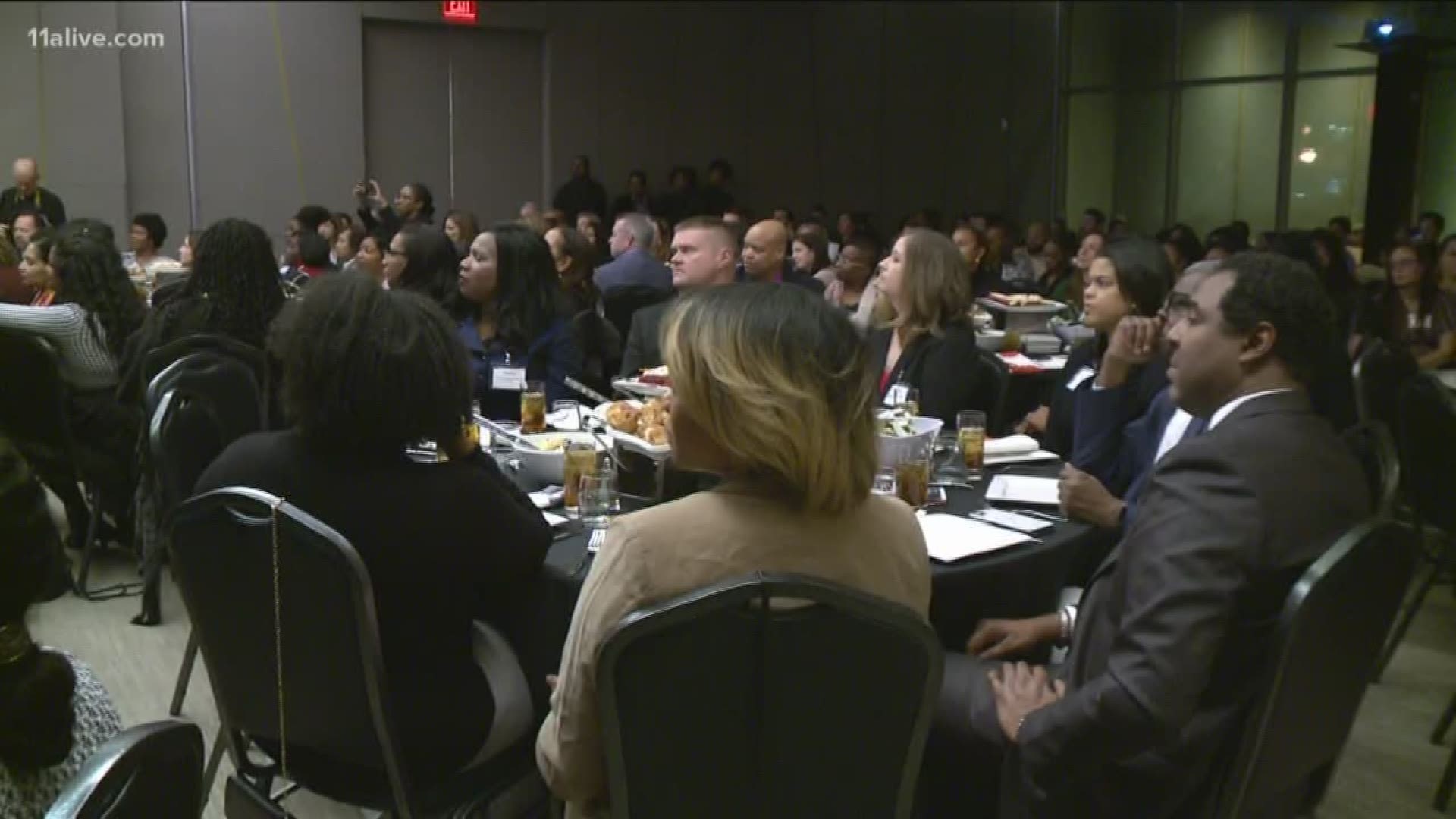 Community leaders set together for the annual Sunday Supper to discuss issues of race and social justice