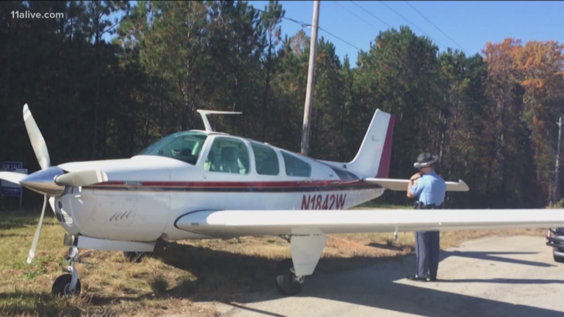 The plane made an emergency landing near a Walmart warehouse near Highway 27. No one was hurt.