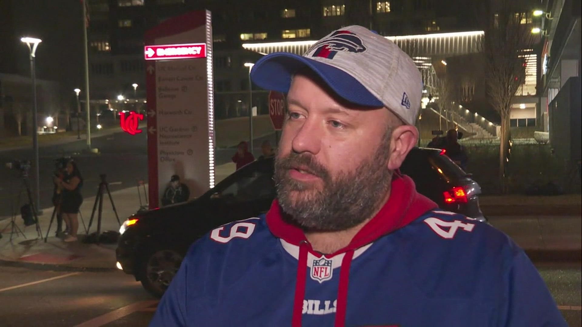 Bills and Bengals Fans Pray for Damar Hamlin Outside Hospital