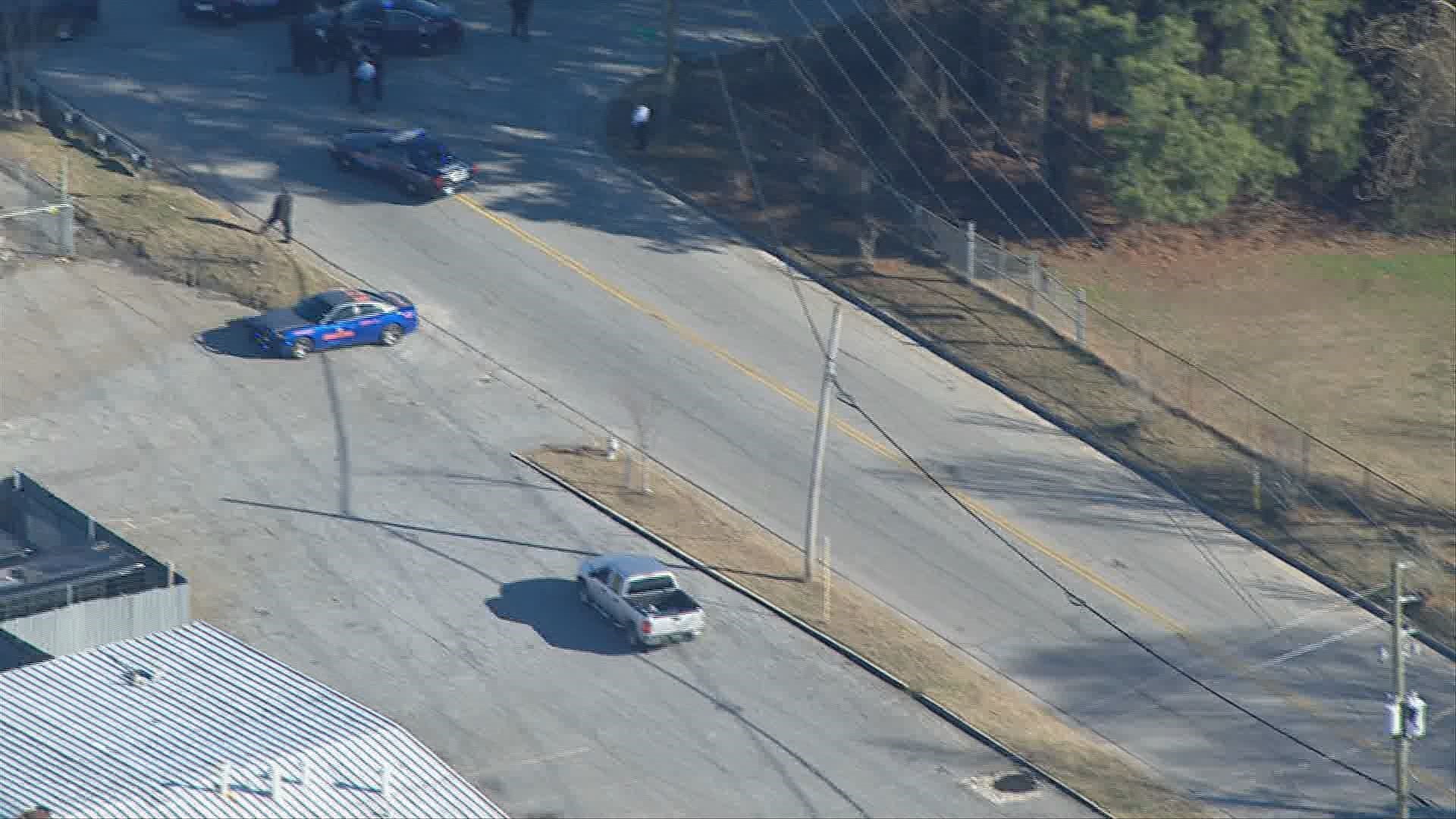 Man shot by police after wrecking, ramming alleged stolen vehicle into ...