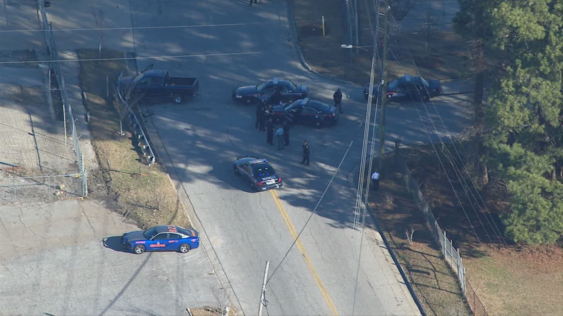 Man shot by police after wrecking, ramming alleged stolen vehicle into ...