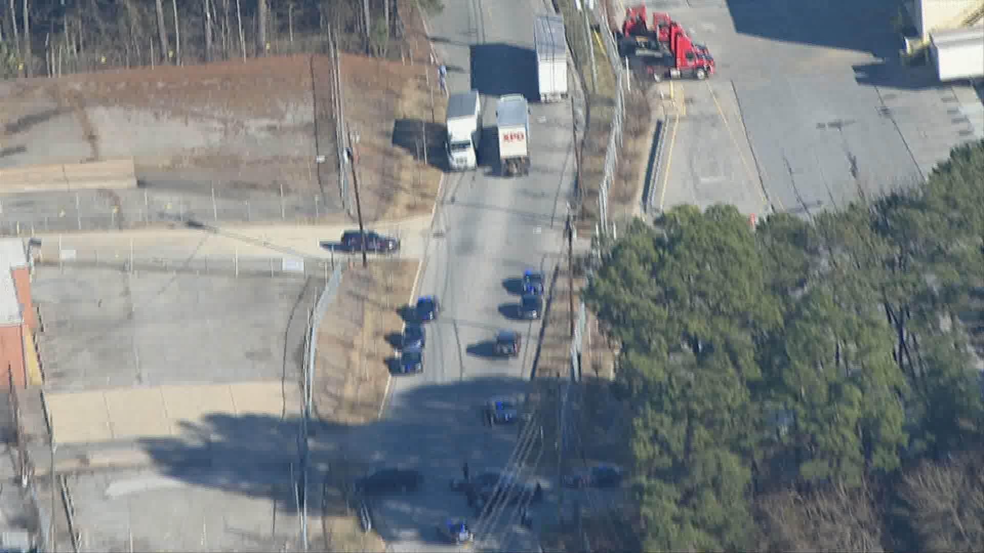 Man shot by police after wrecking, ramming alleged stolen vehicle into ...
