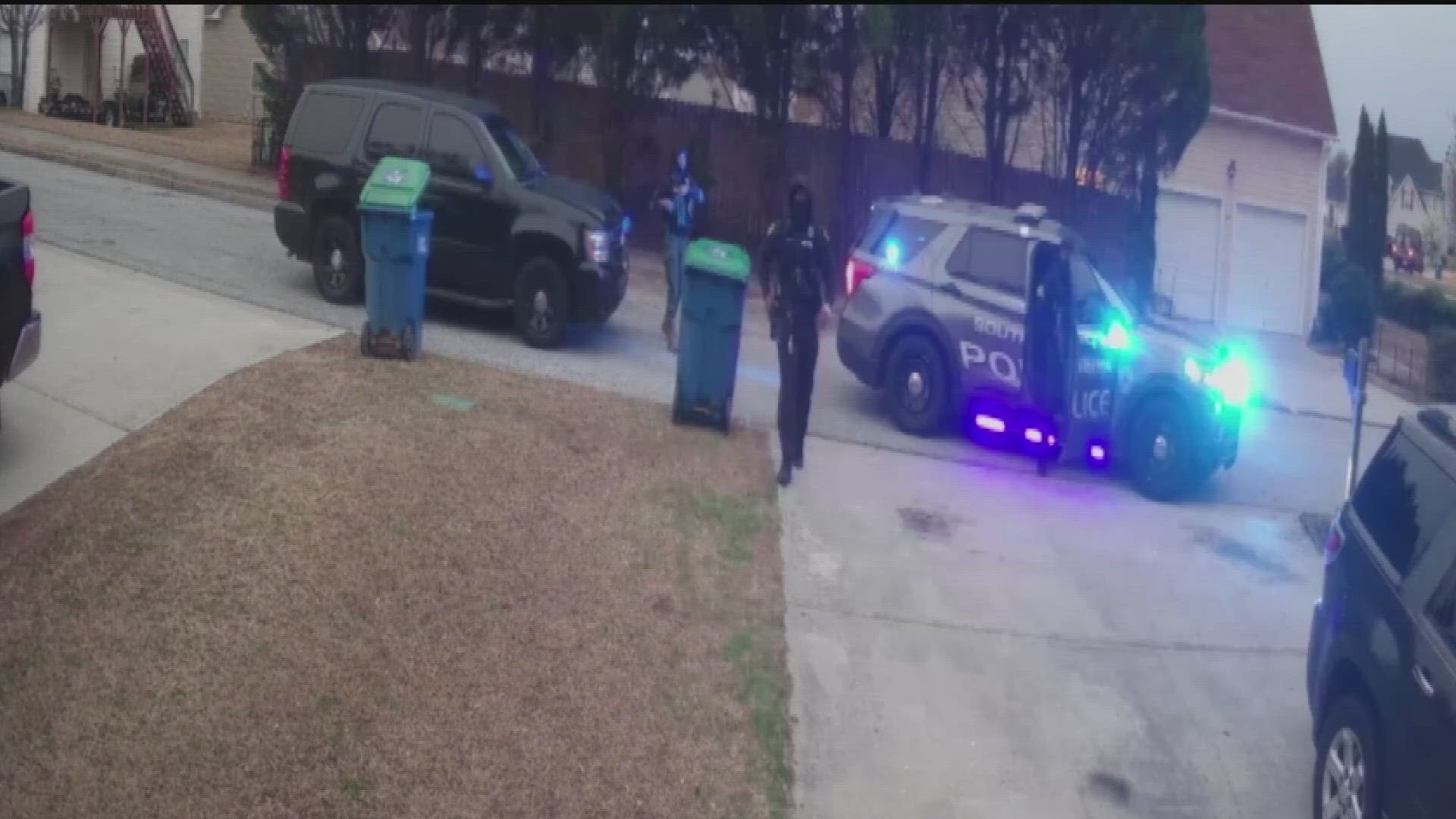 A woman said police wrongly held her at gunpoint while she was trying to get her kids ready for school.