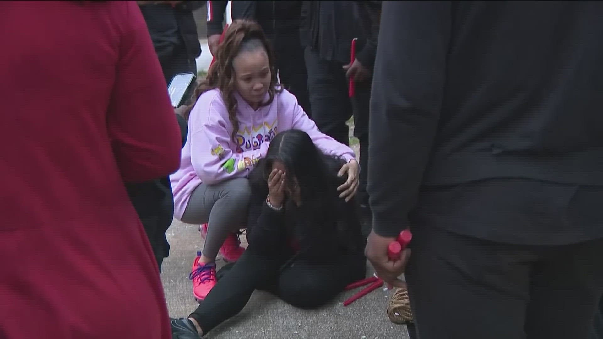 Members held a community prayer walk in honor of both Samuel Moon and Ajanaye Hill on Thursday afternoon, who were killed in Saturday's shooting.