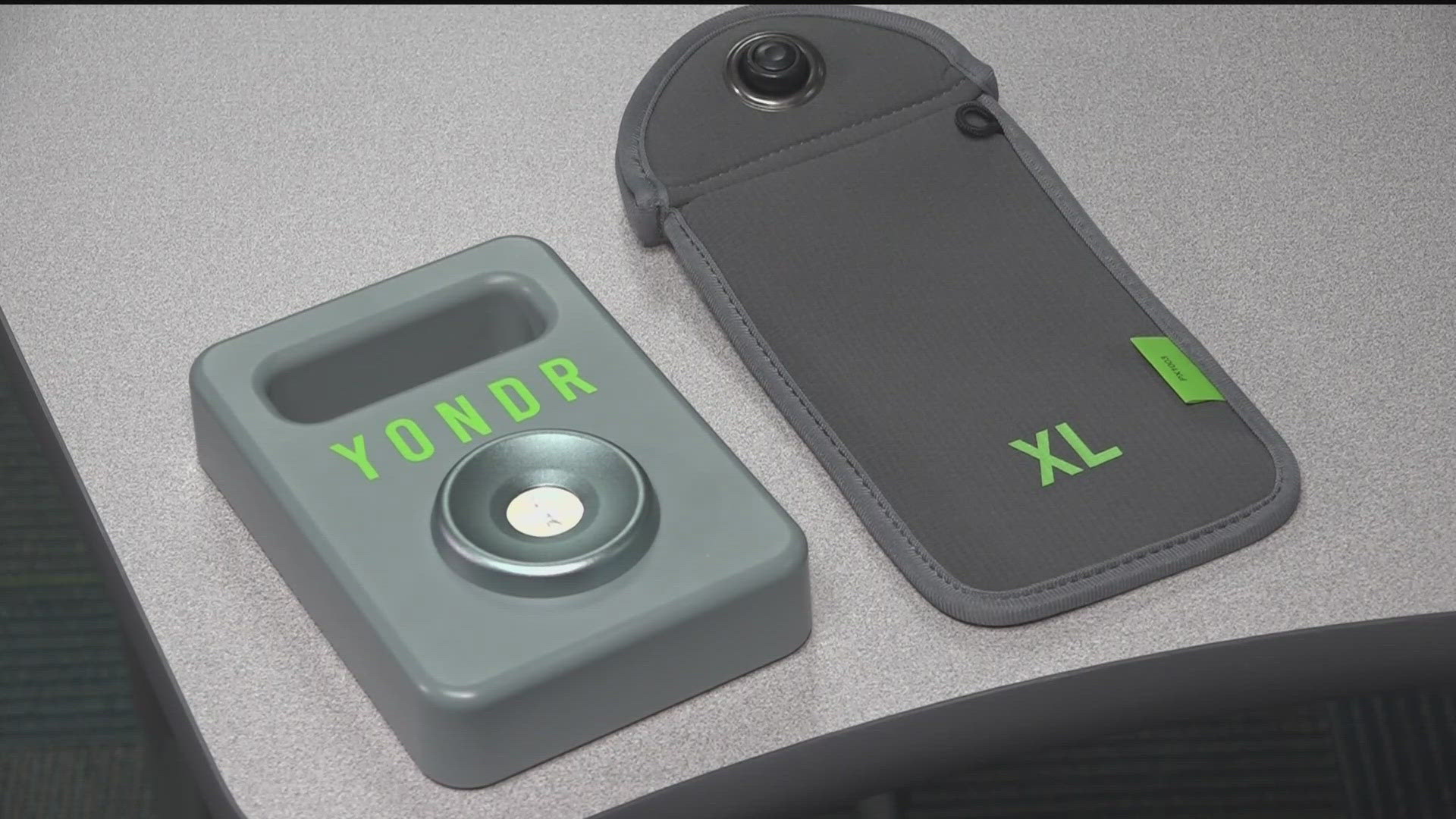 Five middle schools and five high schools will use "Yondr" pouches this fall. Three other schools will try a locker system.