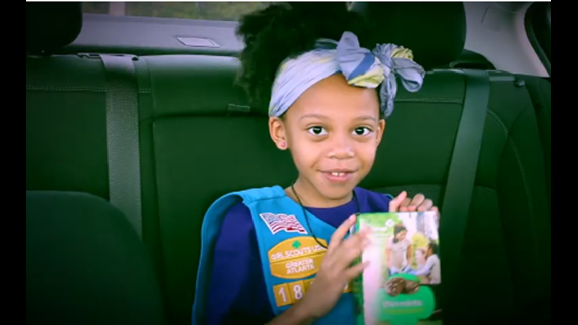 Local dad-daughter duet goes viral in Girl Scout cookie video | 11alive.com