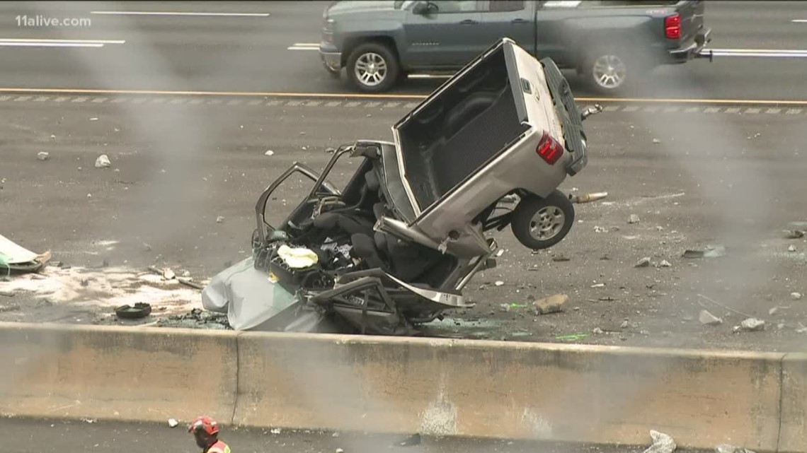 Driver identified after truck crashes off overpass onto I-75 | 11alive.com