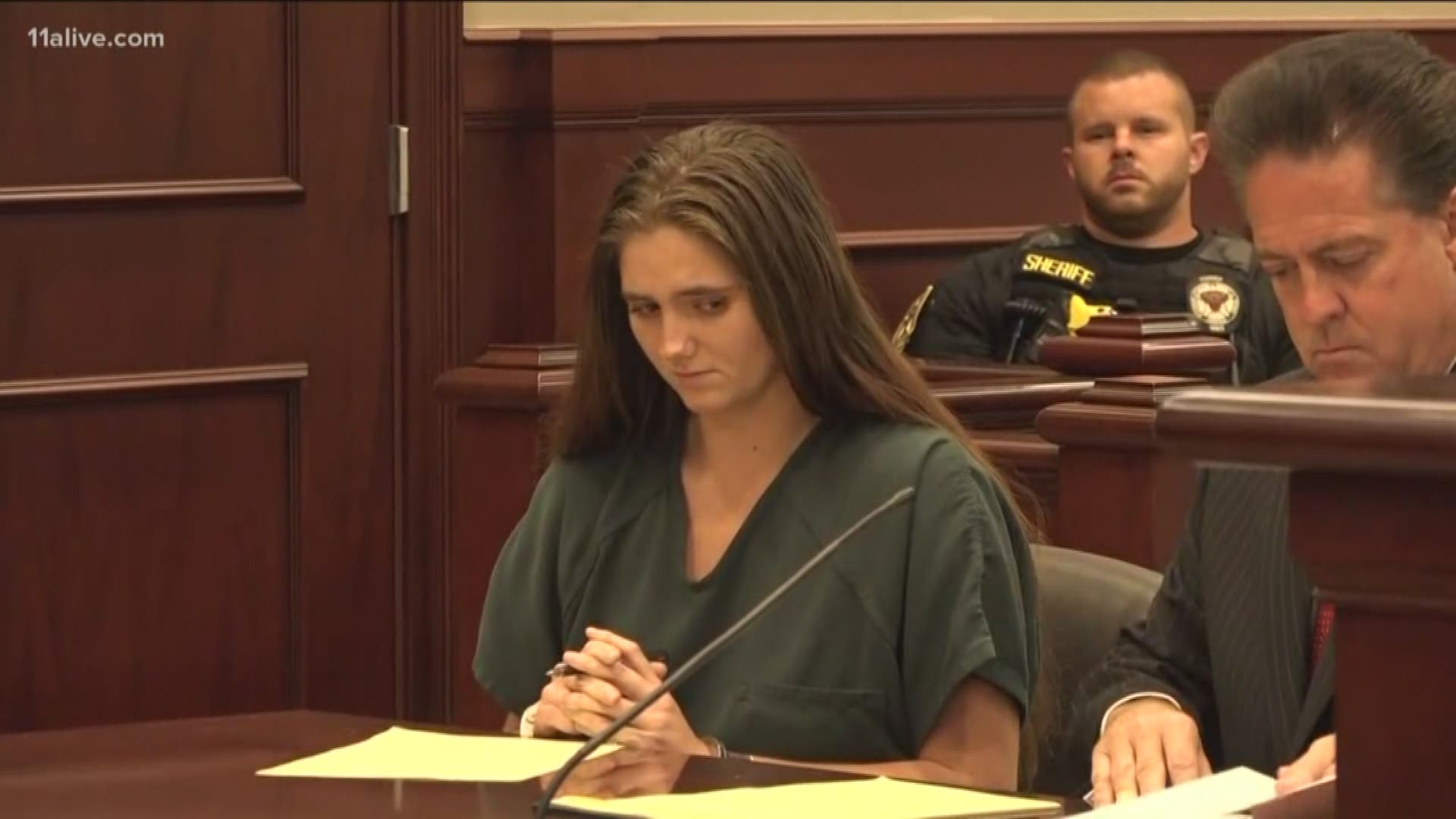 She's accused of witnessing a hitandrun and killing the driver. A