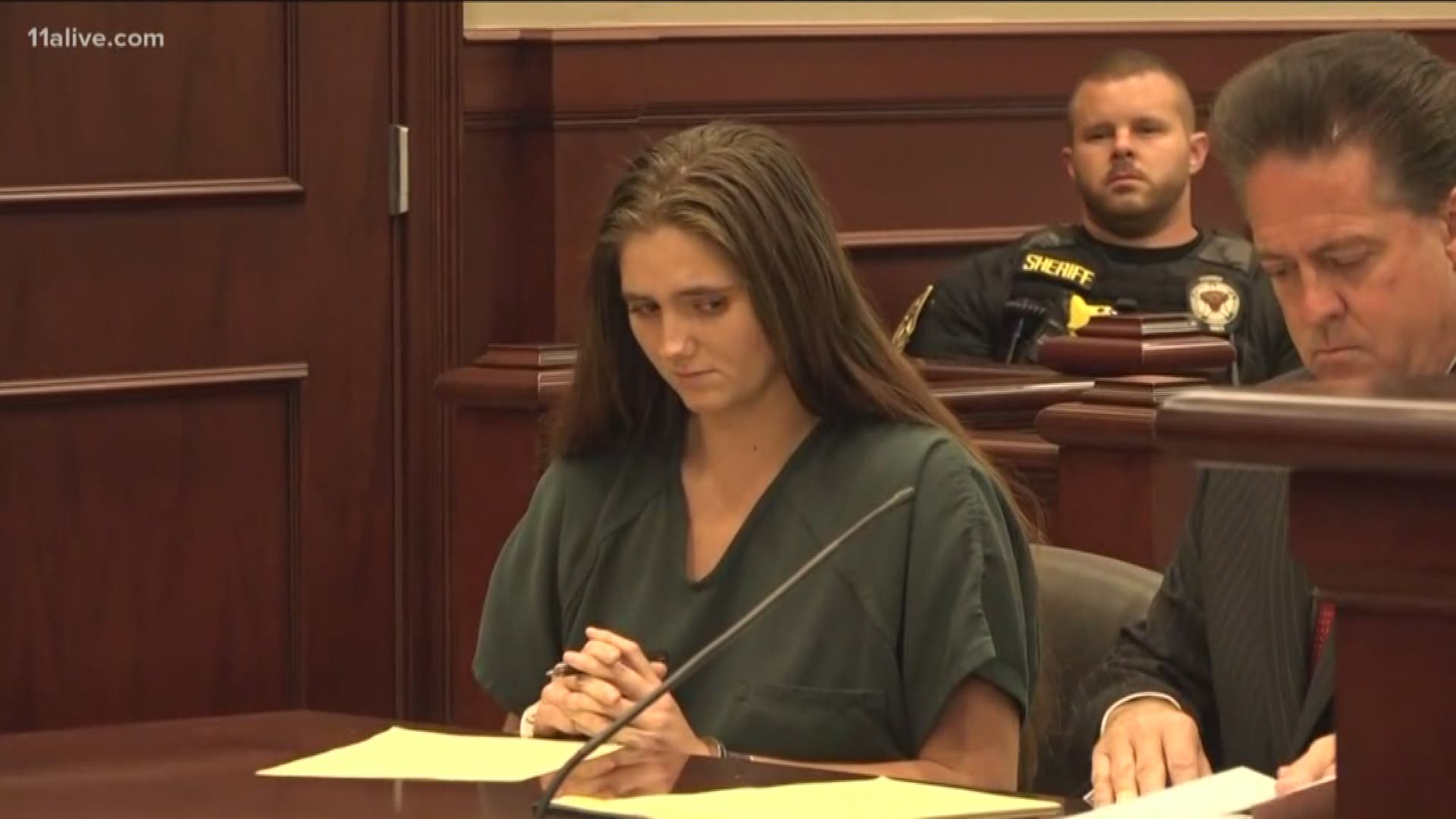 She's accused of witnessing a hit-and-run and killing the driver. A