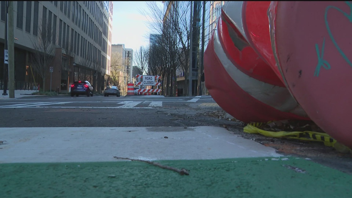 When will Juniper Street's new bike lane open in Midtown Atlanta?