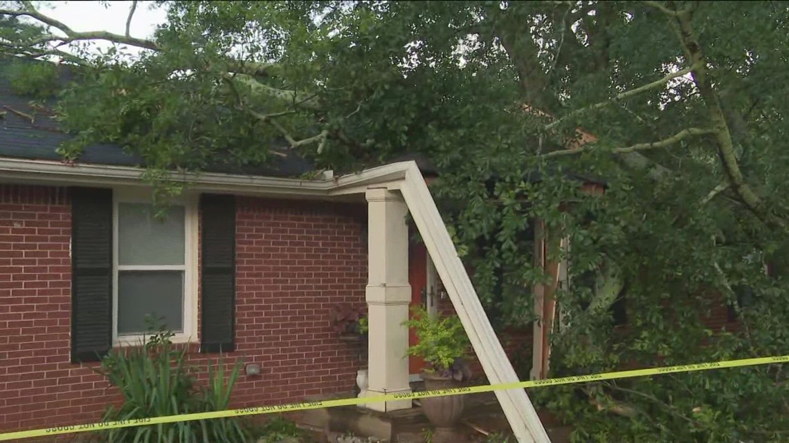 Fallen tree traps woman inside home during overnight storms | 11alive.com