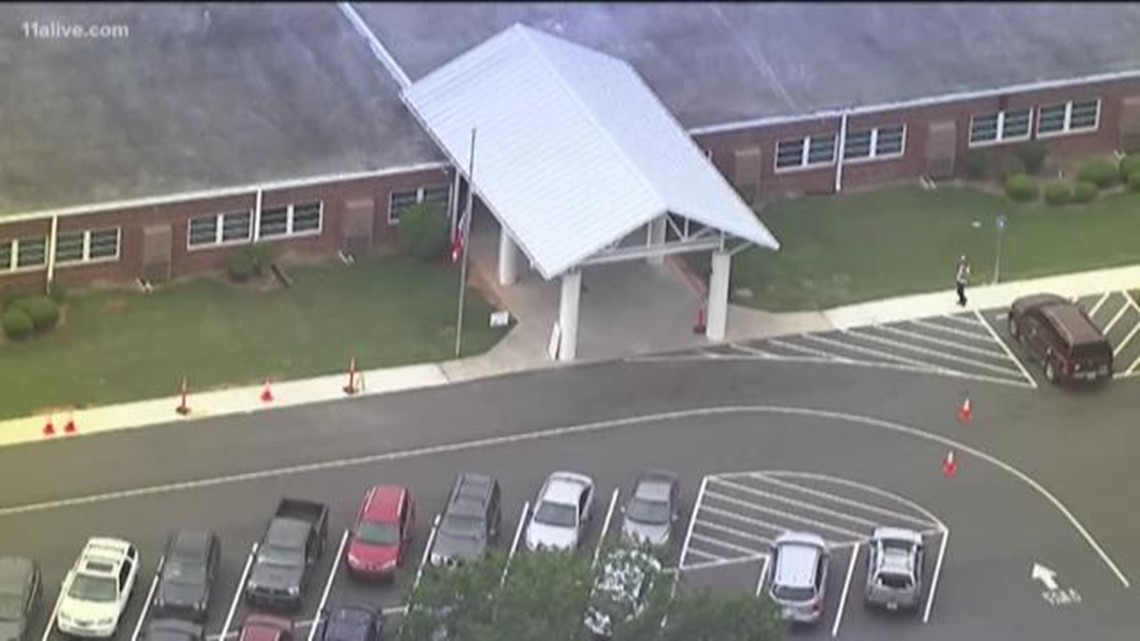 Man shot in elementary school parking lot | 11alive.com