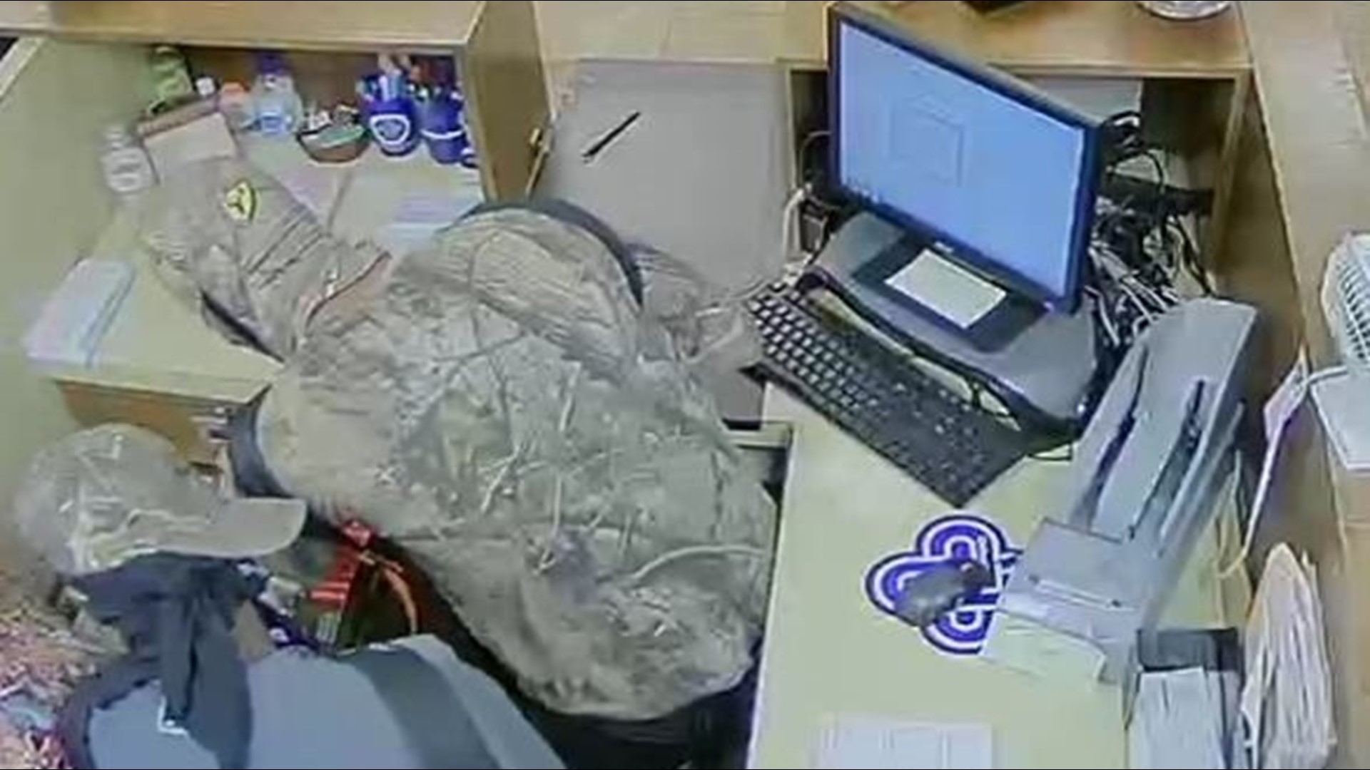 FBI releases new video, photos of suspect wanted in violent Woodbury