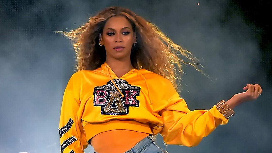Beyonce out in NYC with Jay-Z wearing Rodarte jersey for WOMEN
