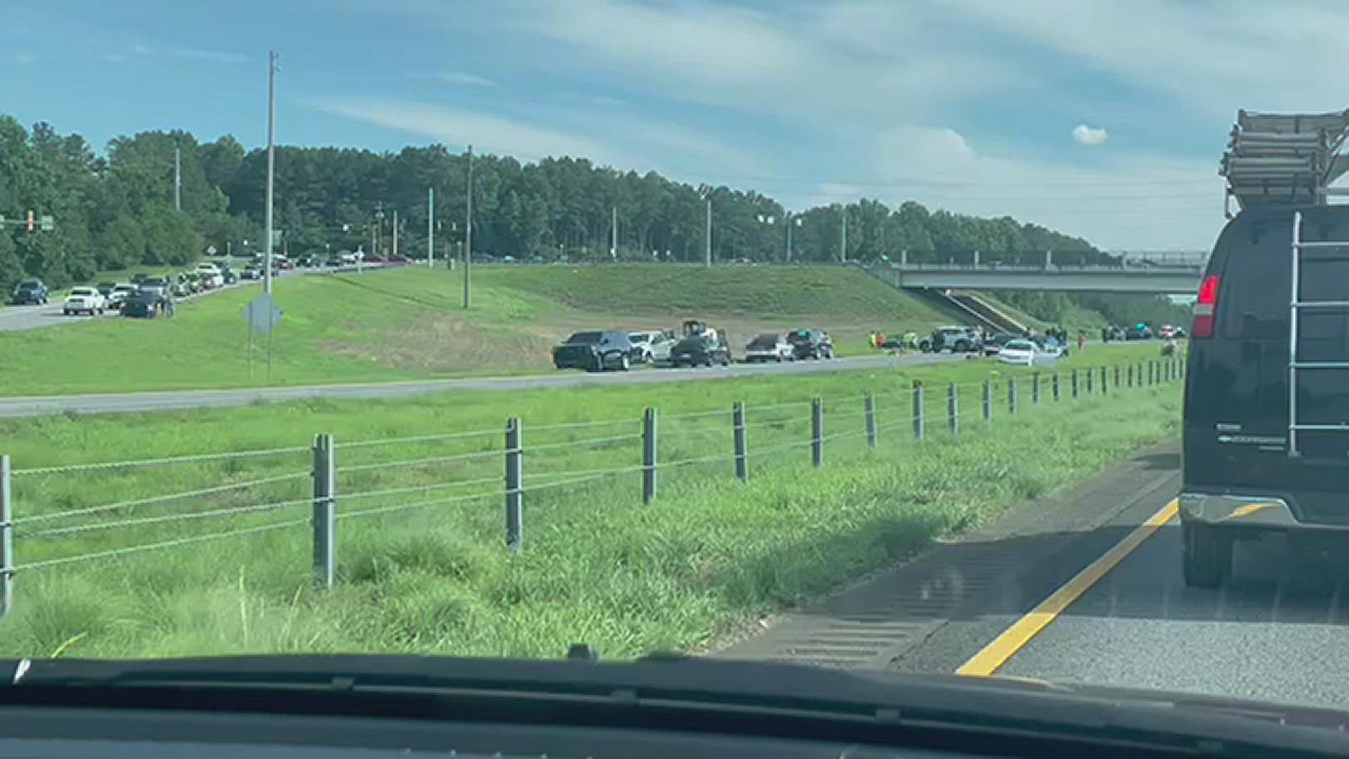 The wreck shut all lanes on I-575 North. The extent of possible injuries in the wreck was not immediately clear.