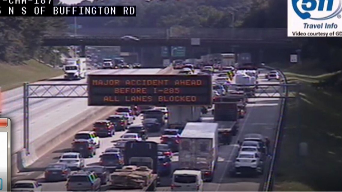 Overturned tractor trailer on I-85 northbound blocks all lanes during ...