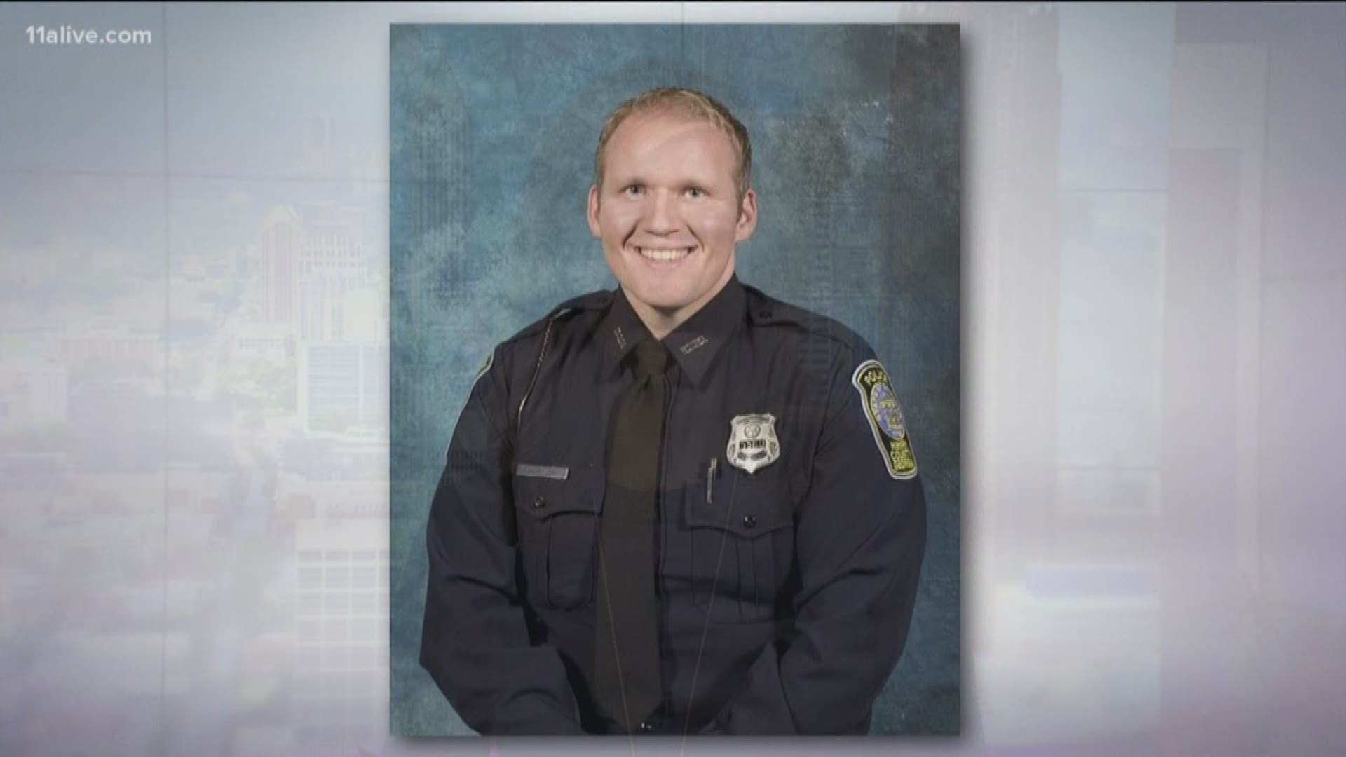 Officer Michael Smith is in critical condition after a struggle with a suspect left him with a gunshot wound in a McDonough dentist's office.