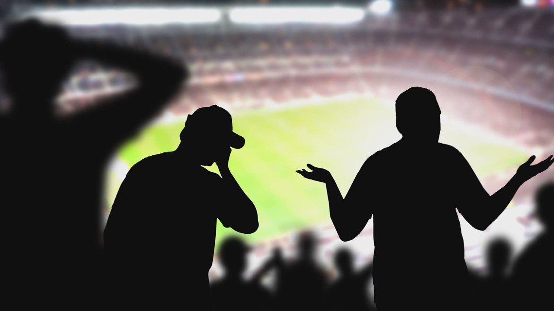 Why do referees wear black and white vertical stripes?