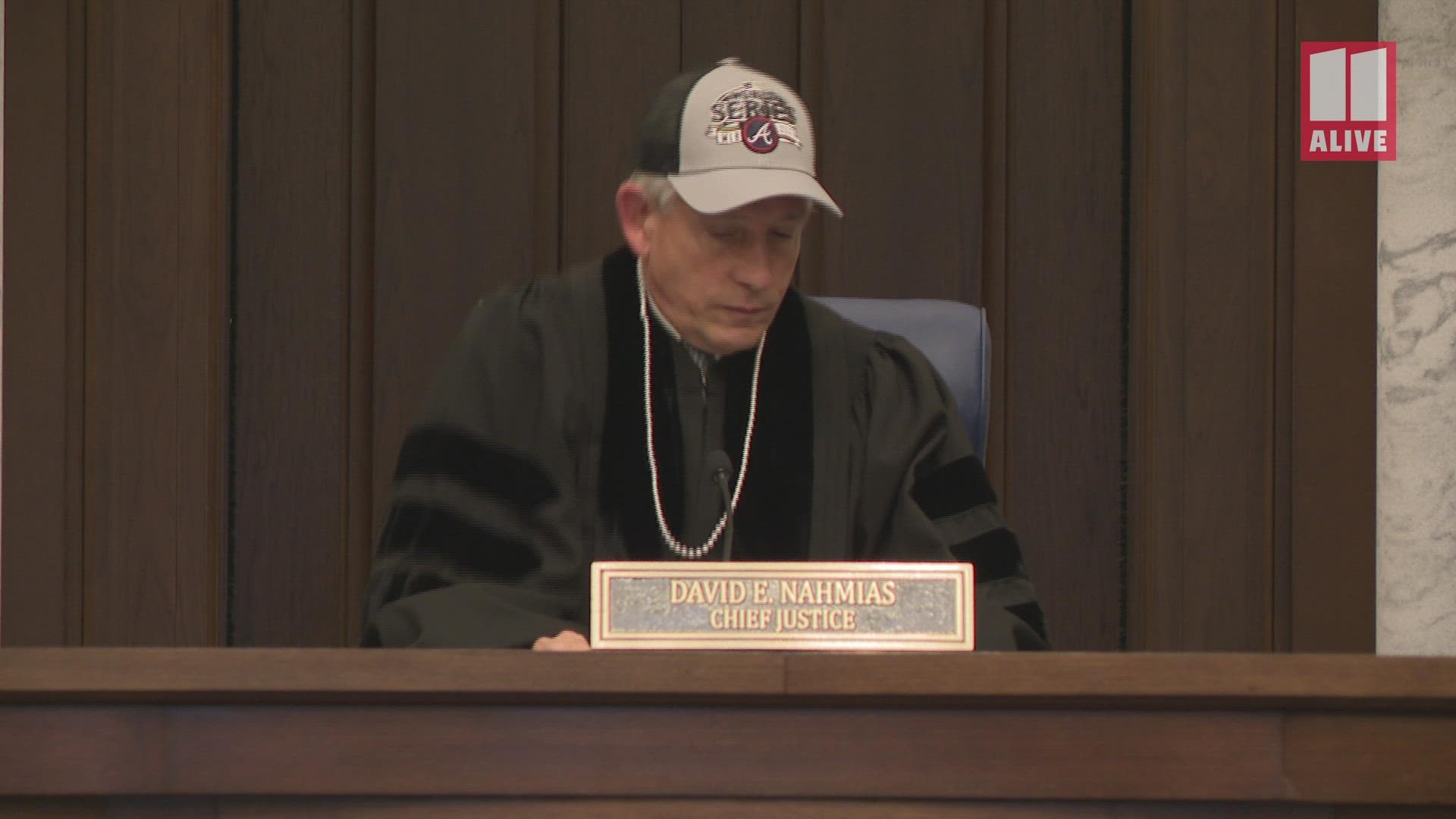During the session, all nine of the state's justices sported Braves baseball caps, along with pearls.
