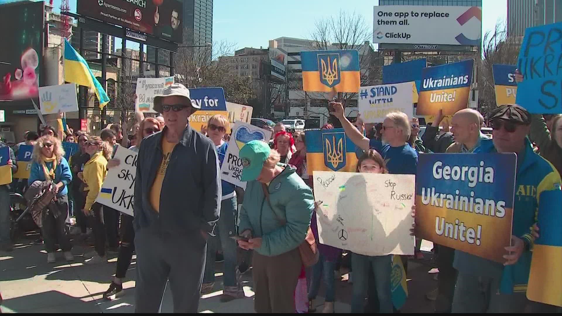 Many protesters were dressed in yellow and blue, the colors of the Ukrainian flag.