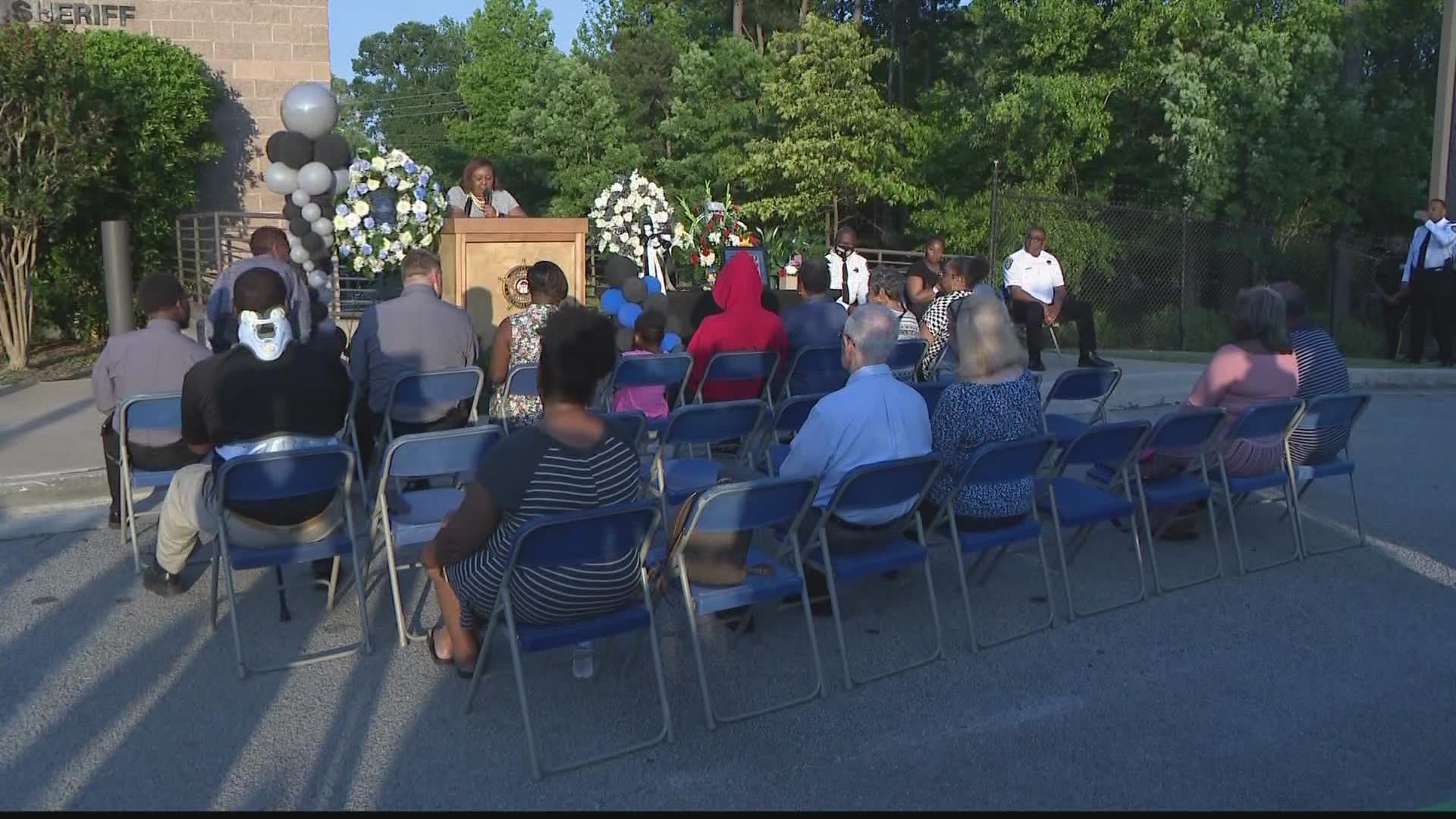 A group gathered Monday night at the sheriff's office for a candlelight vigil.