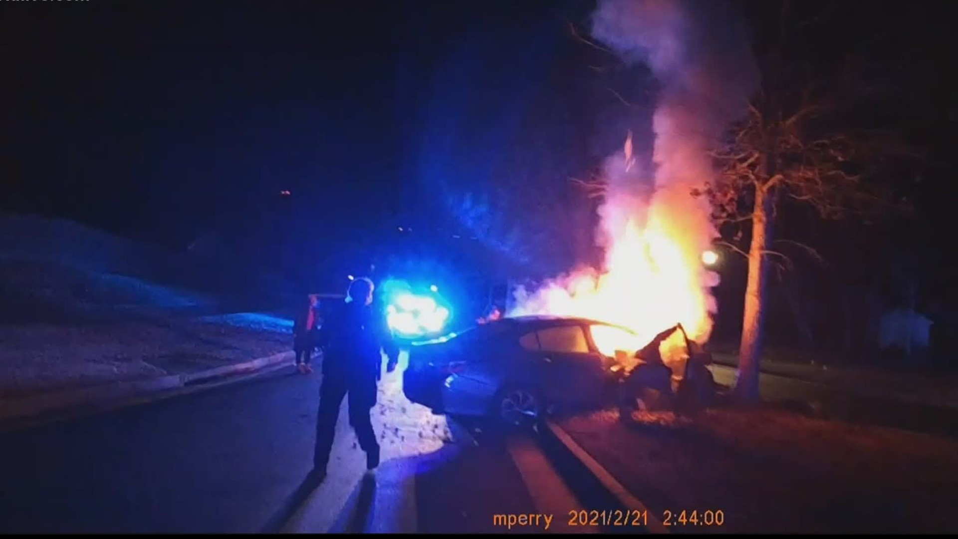 The dramatic rescue was caught on body cam video, as Fayetteville Police officers save a passenger from a fiery crash.