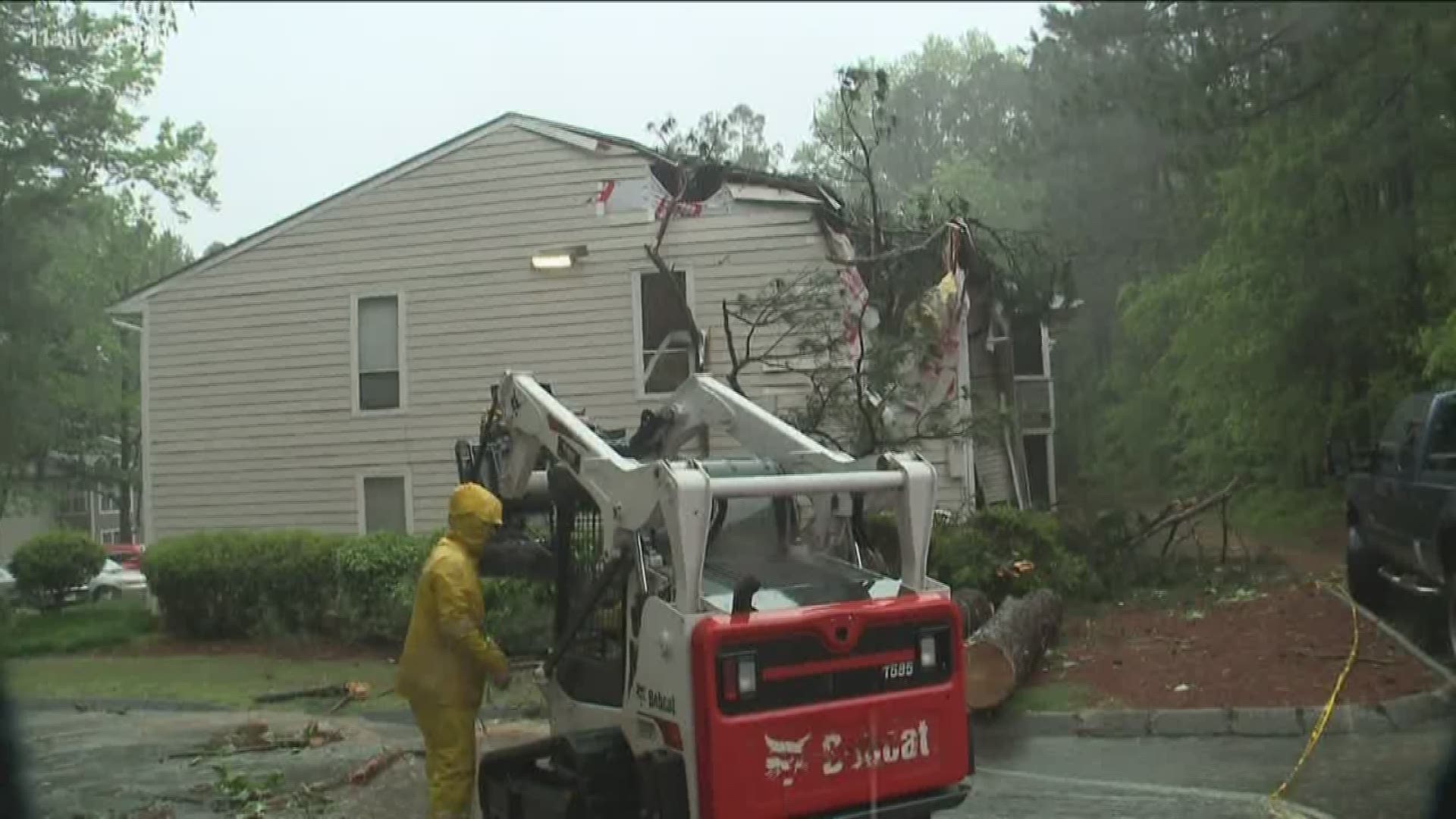 A large tree hit the Column Apartments at Peachtree Corners after Friday's damaging storm.