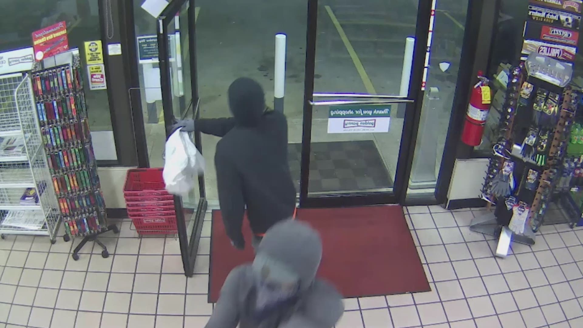 Three armed robbery suspects are clearly seen on surveillance video from an early morning heist at a convenience store in Athens early Tuesday morning. All three have bandannas over their faces and are wearing hoodies.