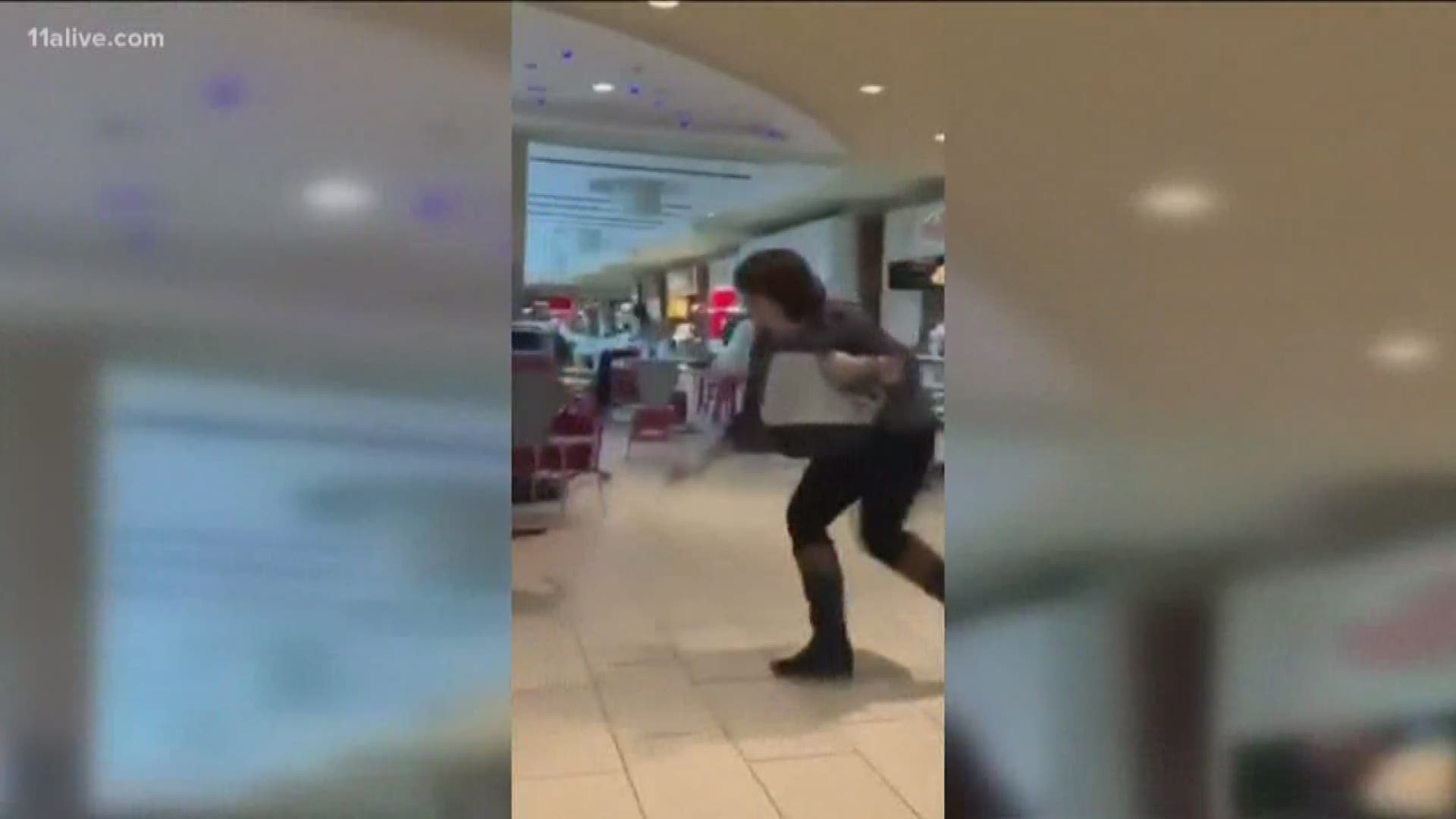 Video shared online shows the panic as shoppers rush for cover.