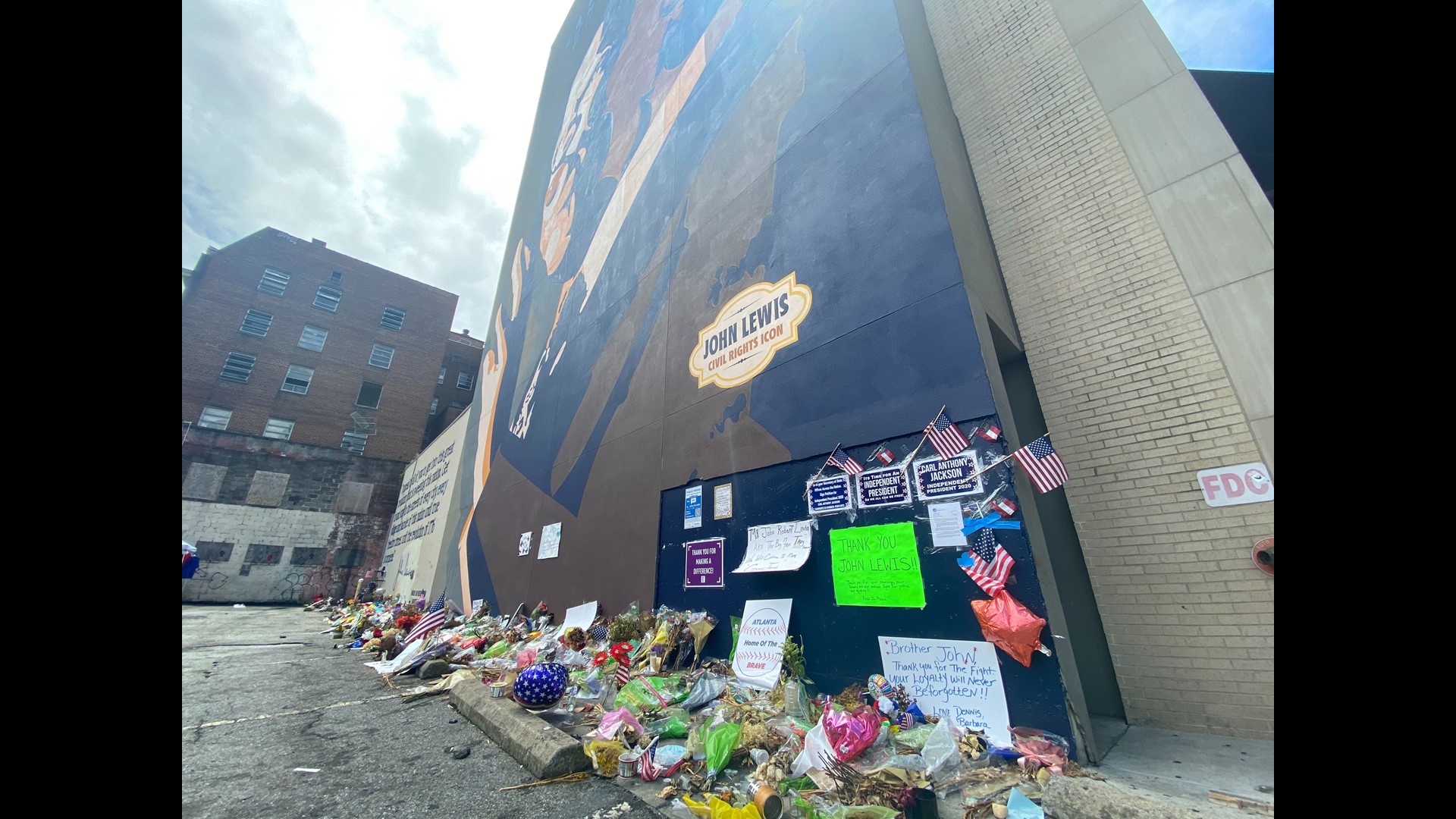 John Lewis mural unveiled over Atlanta skyline