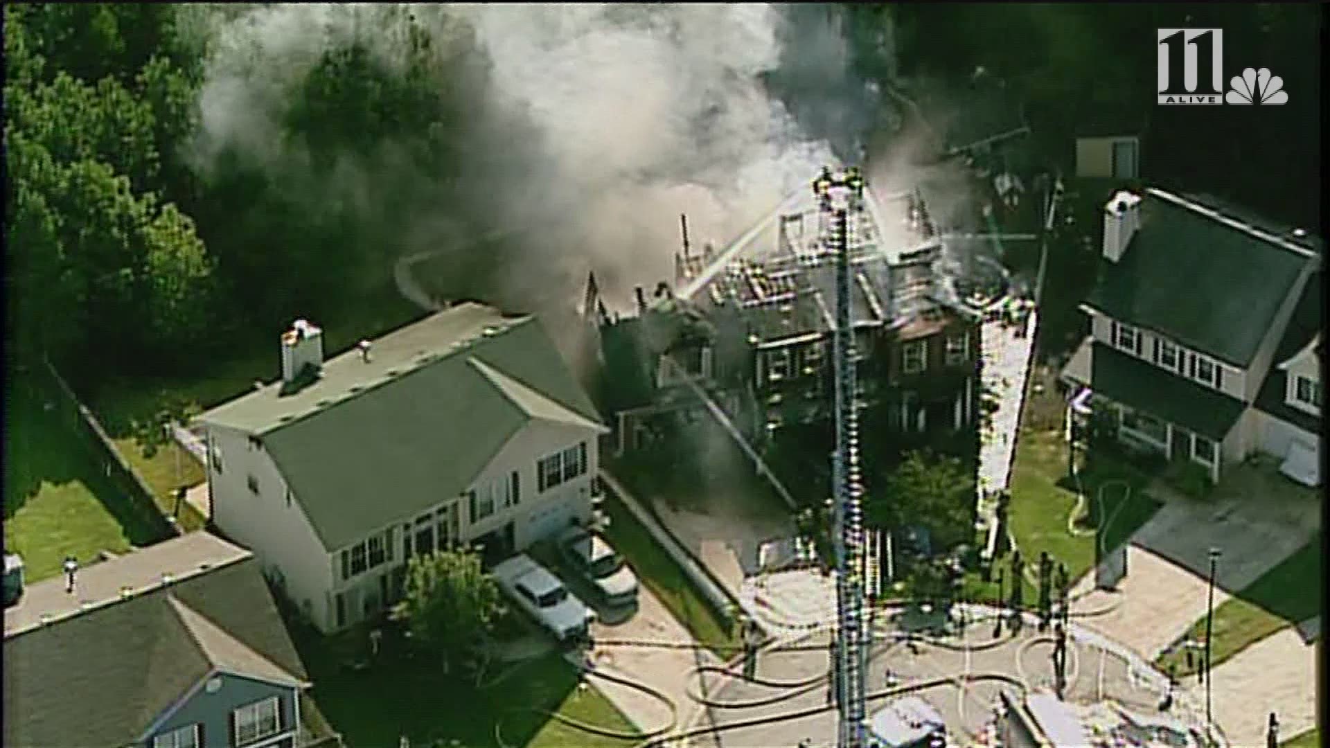 Crews battle fire at County home