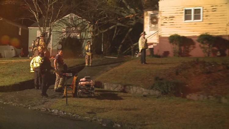Firefighters rescue man trapped by collapsed roof | 11alive.com