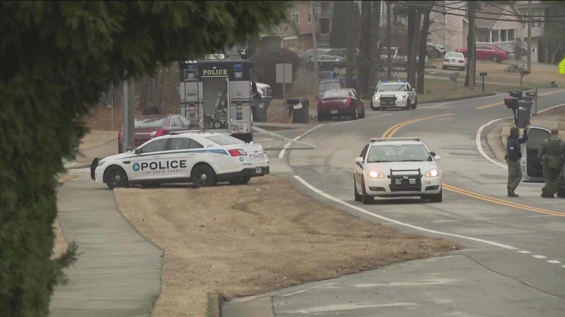 Brookhaven Police officers were shot at while trying to serve an arrest warrant.