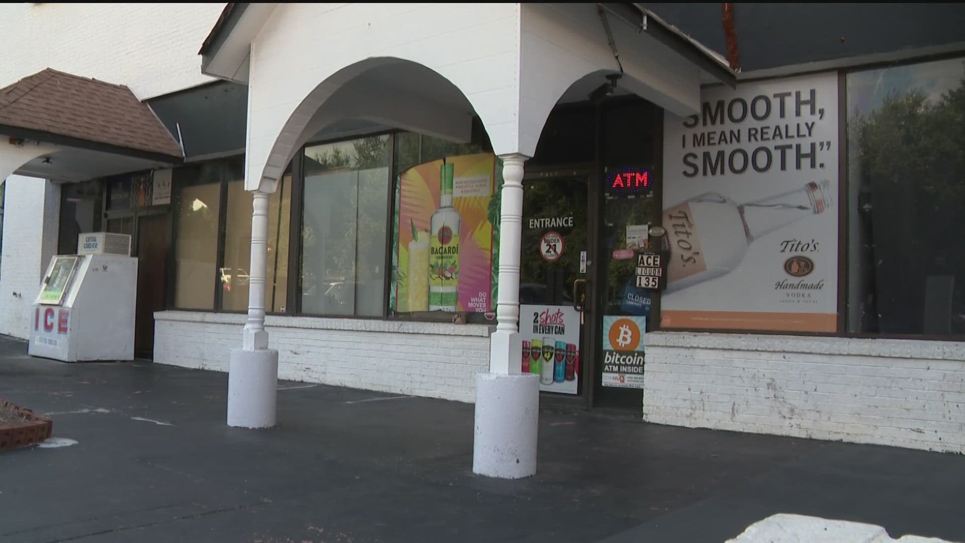 Two men at a Marietta liquor store are facing multiple felony charges after police said they held a man at gunpoint. 