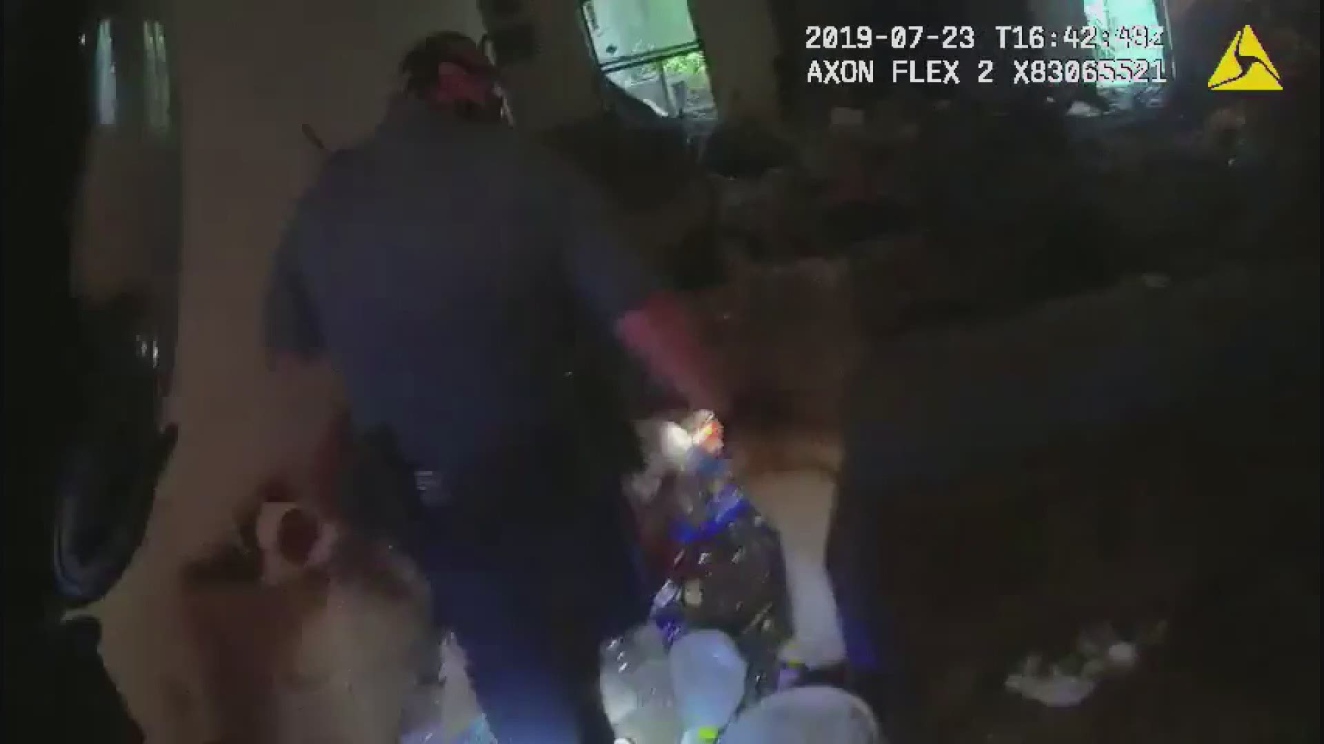 Bodycam footage from Gwinnett Police Department showing the inside of the Lawrenceville home.